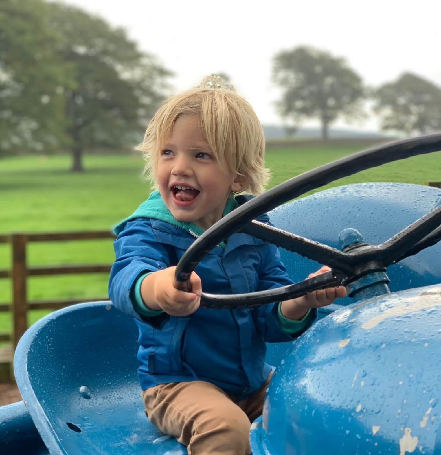 Image of our client Seb Collins sitting on a tractor